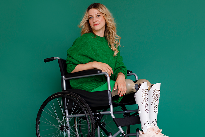 Smiling disabled woman on wheelchair